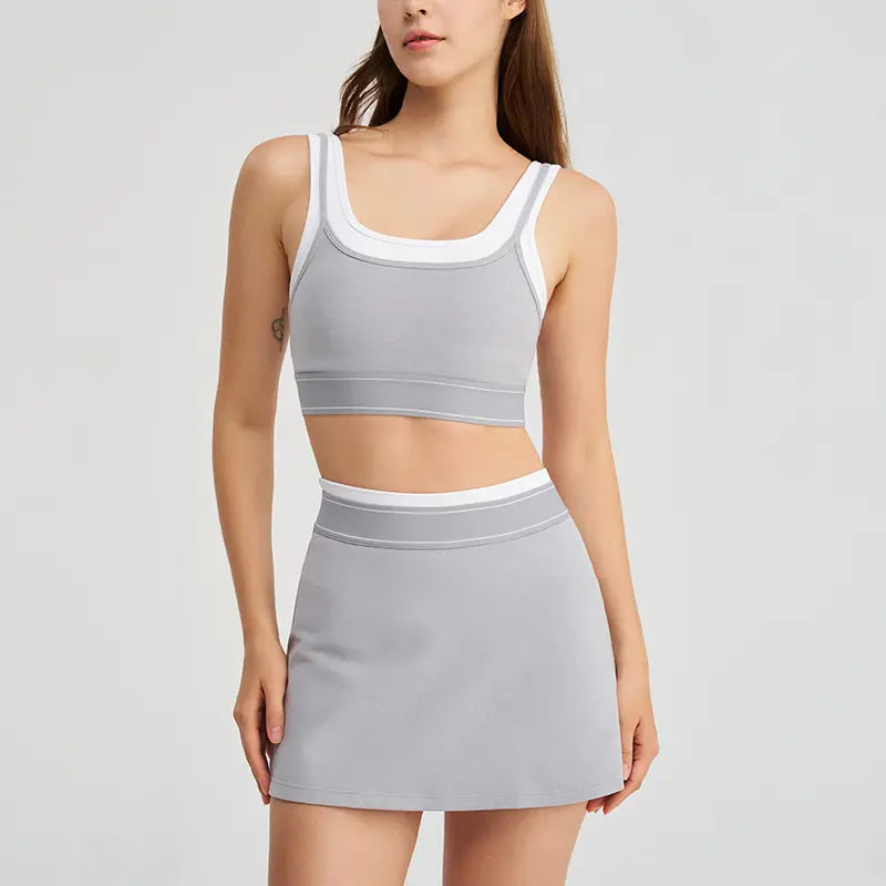 2026 New Women 2-Piece Color Block Striped Cami Sports Bra & Tennis Skort Yoga Outfit, Fake Two-Piece Contrast White Strap Tank Top with Built-In Pads, Anti-Run Liner Pleated Athletic Skirt Set for Running Tennis Gym Workout Daily Active Wear